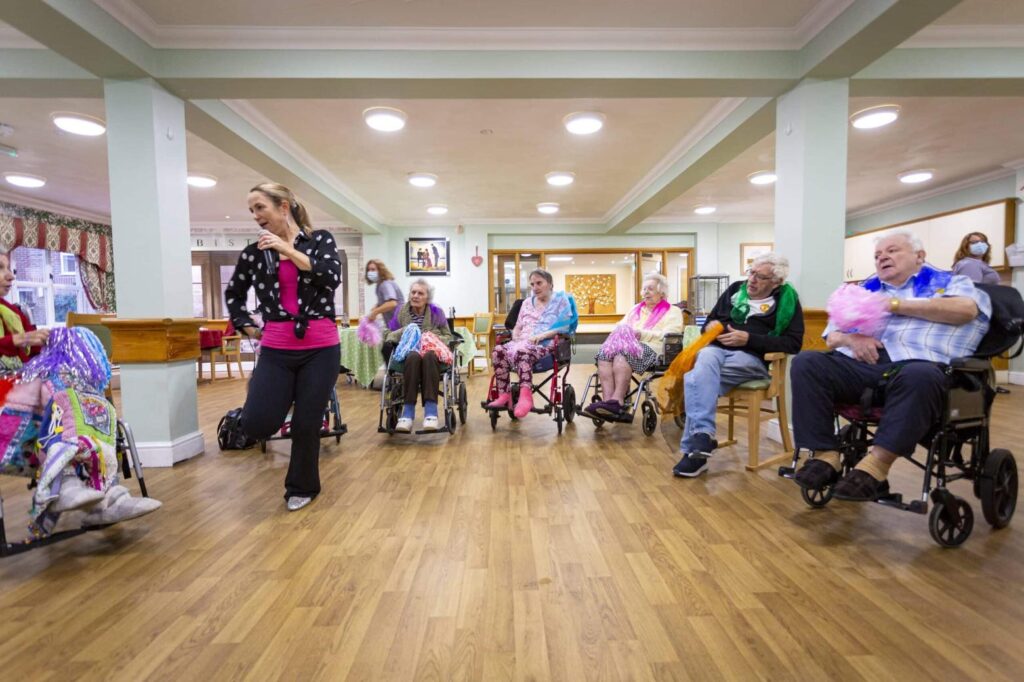 Residents Dancing With Entertainer