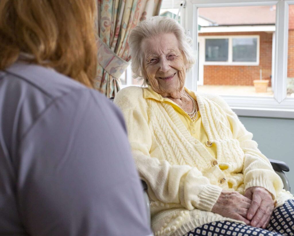 Resident Smiling at Carer