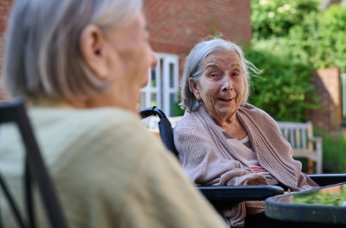 residents chatting in the garden together