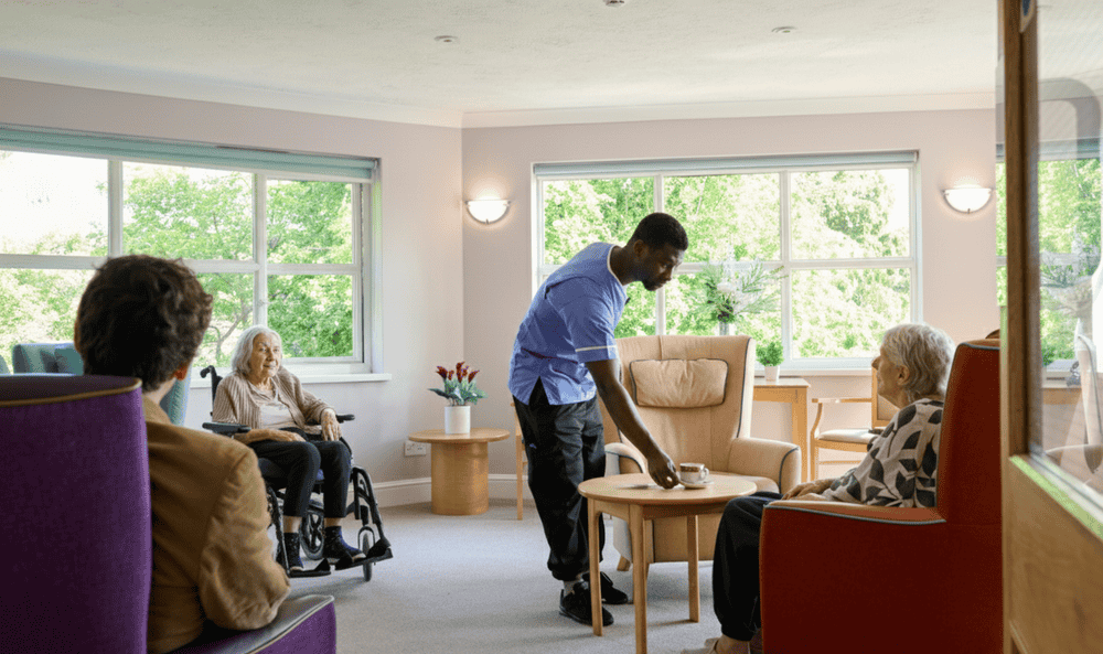 Care home nursing caring for resident